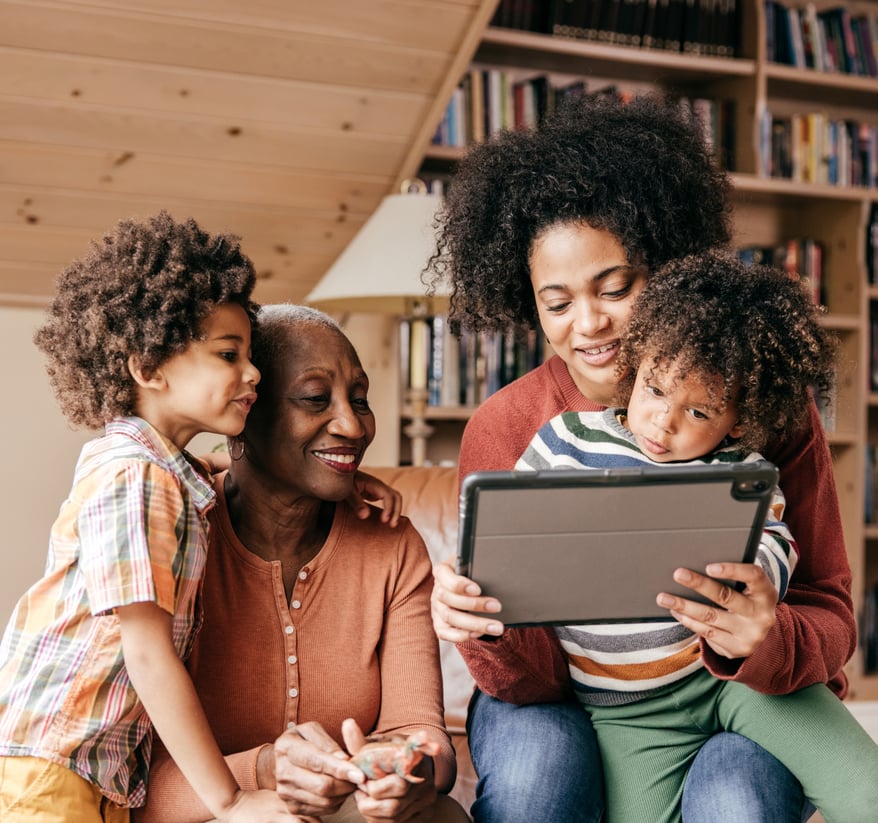 A happy multi-generational family enjoying Wi-Fi that actually works